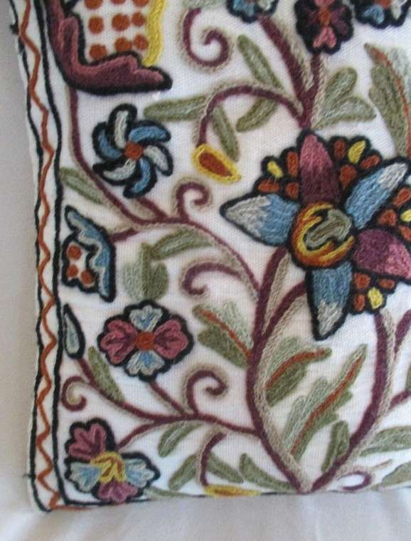 Lovely copiously embroidered cushion with floral design