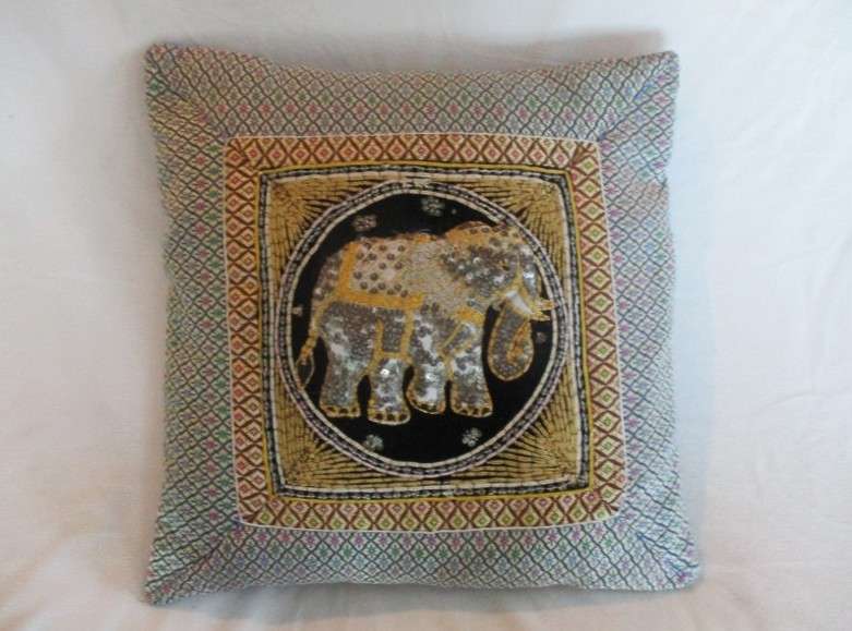 A rare vintage Burmese Kalaga tapestry cushion