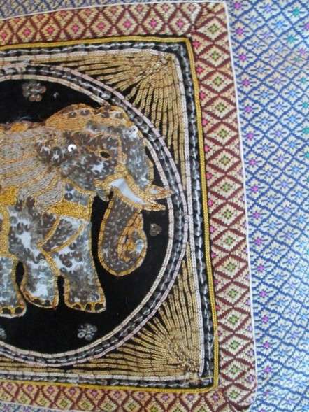 A rare vintage Burmese Kalaga tapestry cushion