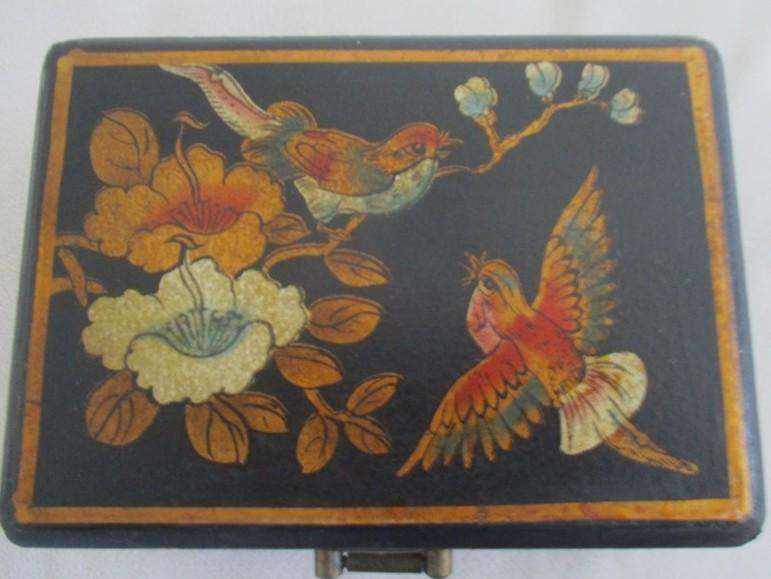 A vintage hand painted oriental "treasure box" with beautiful floral and bird  painted on leather