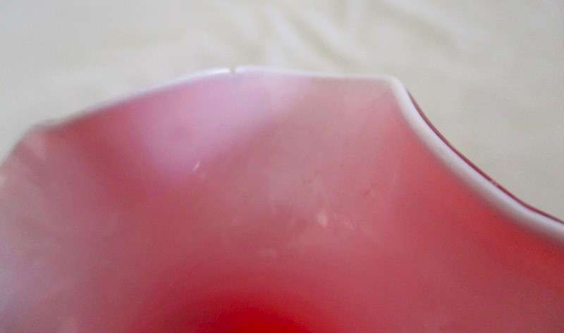 Vintage 18cm tall red hand blown art glass vase with fluted rim and applied floral design