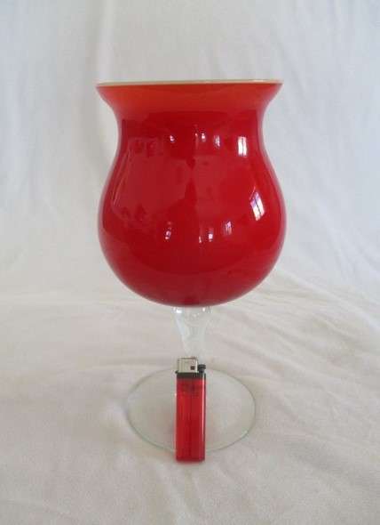 A very large (27cm tall) red glass goblet vase