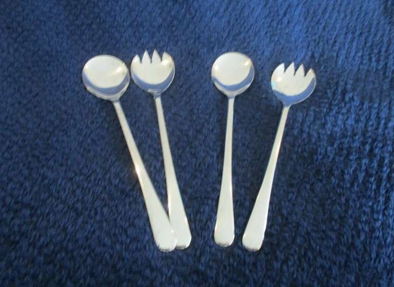 Two sets of Mayell, England silver tone salad servers for one bid