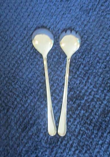 Two sets of Mayell, England silver tone salad servers for one bid
