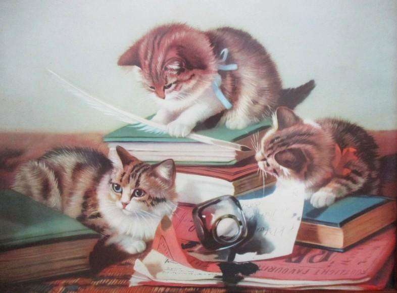 A charming vintage print of three naughty cats framed in wood