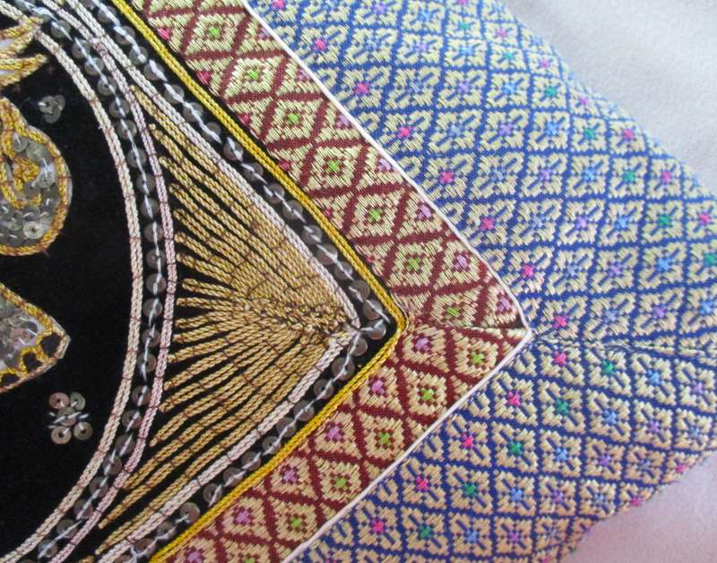 A rare vintage Burmese Kalaga tapestry cushion