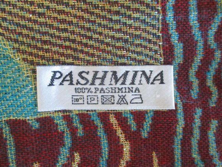 A striking reversable 100% Pashmina/Throw with gold thread