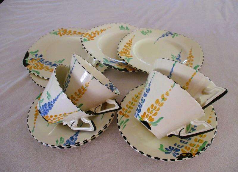 Four rare 1930's Art Deco Burleigh Ware Zenith trios with blue and yellow lupins