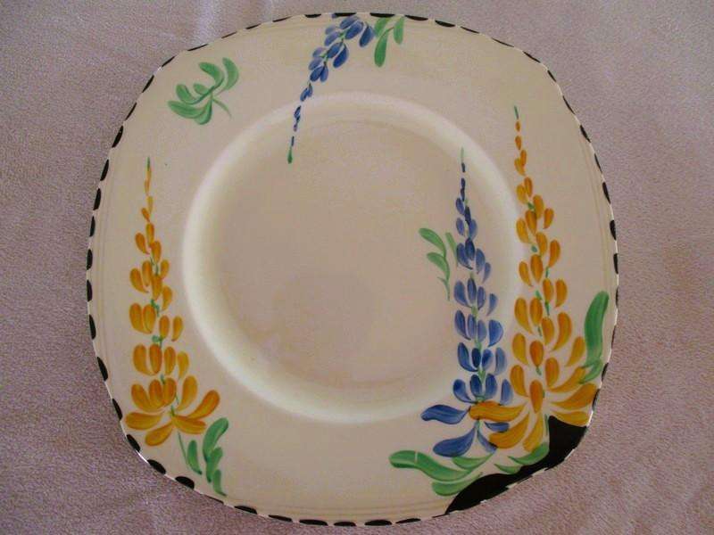 Four rare 1930's Art Deco Burleigh Ware Zenith trios with blue and yellow lupins