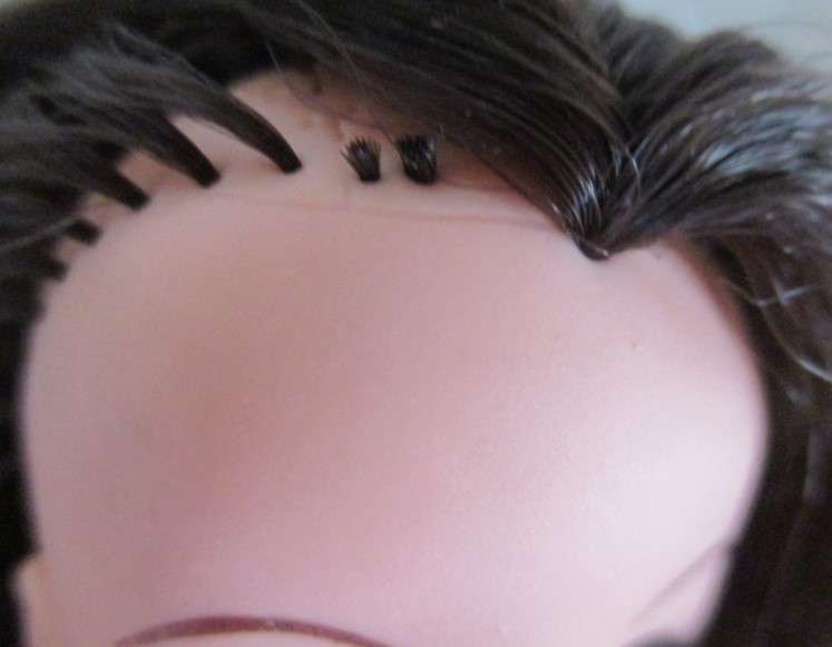 A vintage brunette Sindy doll in cute p.j. outfit