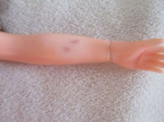 A vintage brunette Sindy doll in cute p.j. outfit