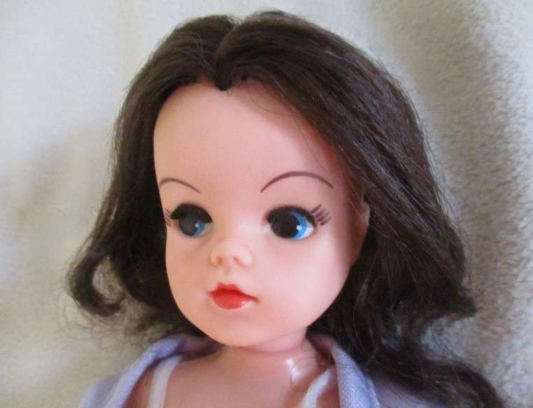 A vintage brunette Sindy doll in cute p.j. outfit
