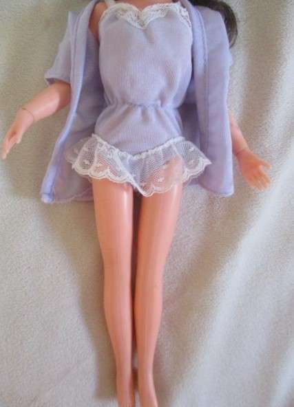 A vintage brunette Sindy doll in cute p.j. outfit
