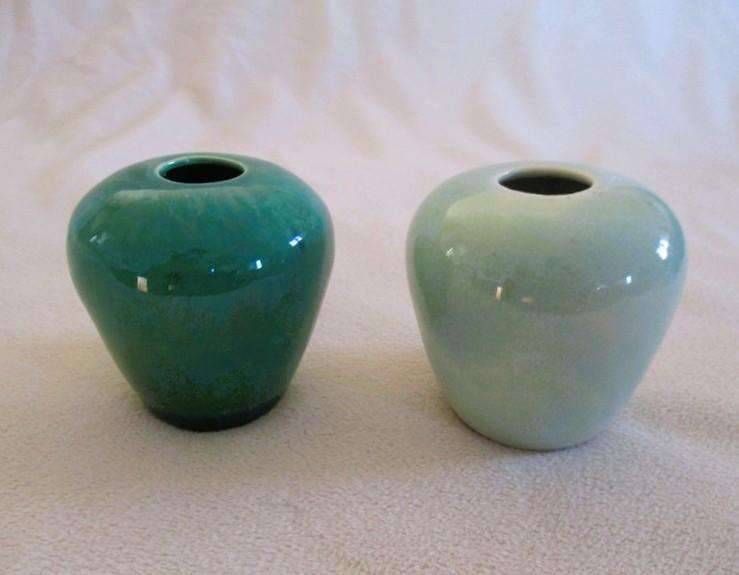 Four beautiful glazed ceramic small vases for single-flower displays