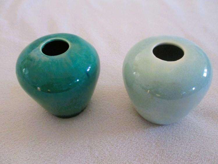 Four beautiful glazed ceramic small vases for single-flower displays