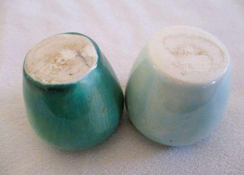Four beautiful glazed ceramic small vases for single-flower displays