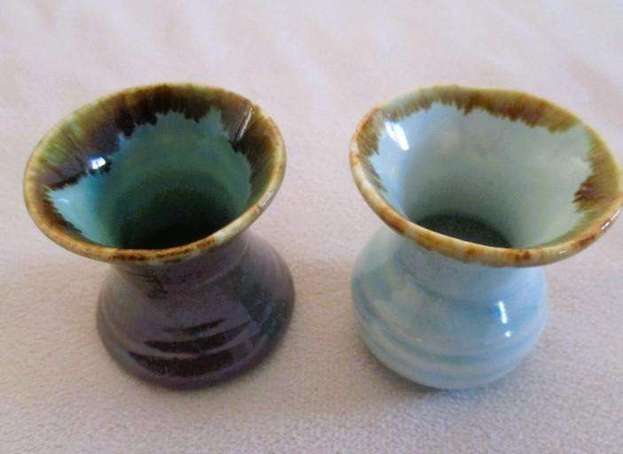Four beautiful glazed ceramic small vases for single-flower displays