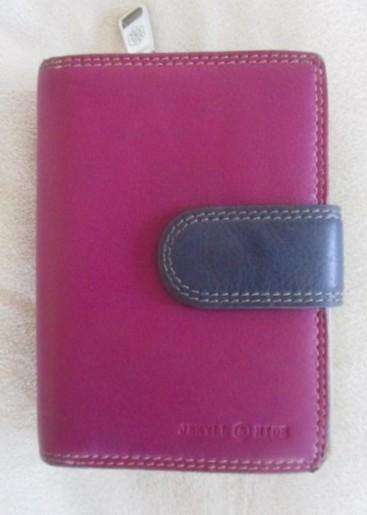 Two genuine leather Jekyll & Hide wallets - one for men, one for women