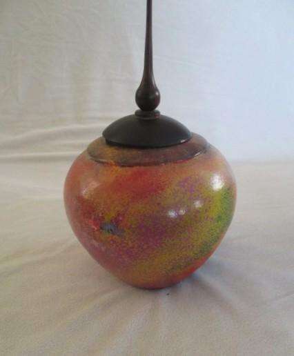 Artistic wood-turned box by Durham Woodturners, England with swirls of colour
