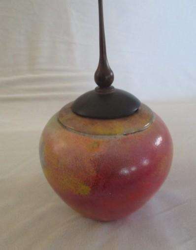 Artistic wood-turned box by Durham Woodturners, England with swirls of colour