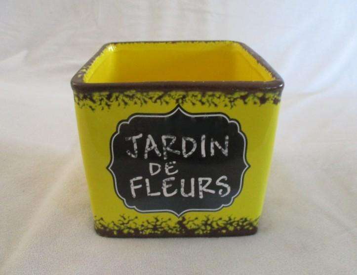 A cheerful "Jardin de fleurs" ceramic planter