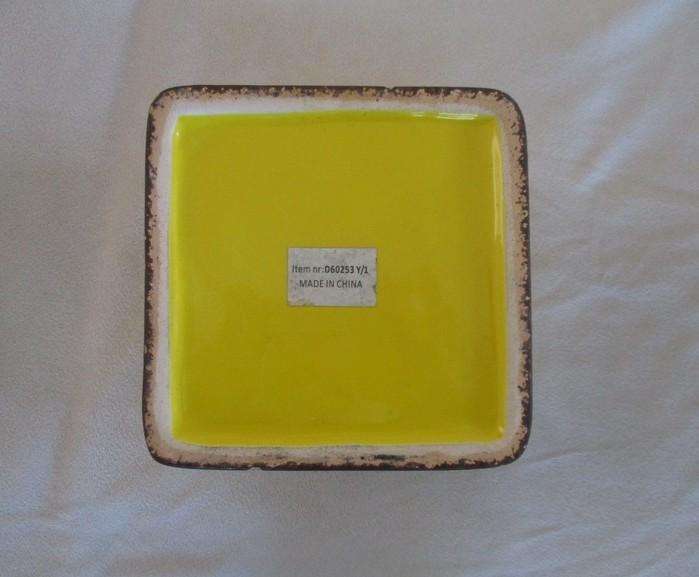 A cheerful "Jardin de fleurs" ceramic planter