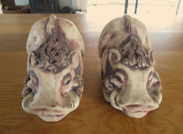 So original! a pair of large ceramic warthog bookends
