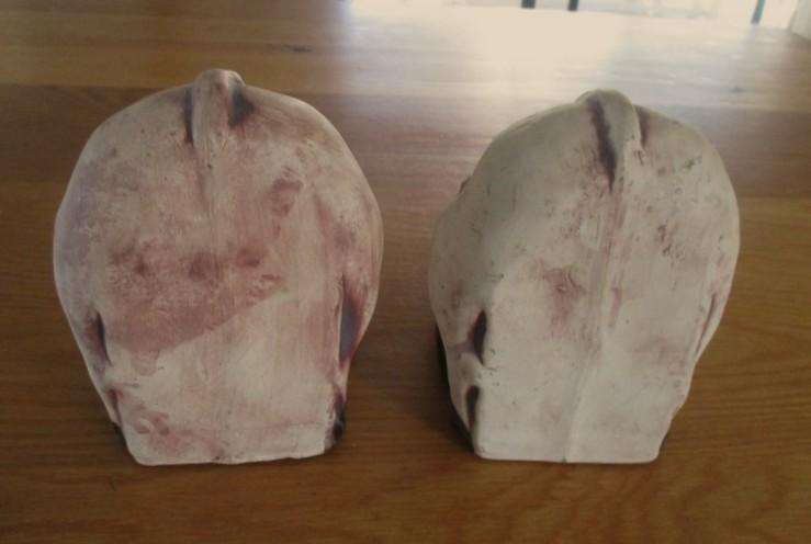 So original! a pair of large ceramic warthog bookends