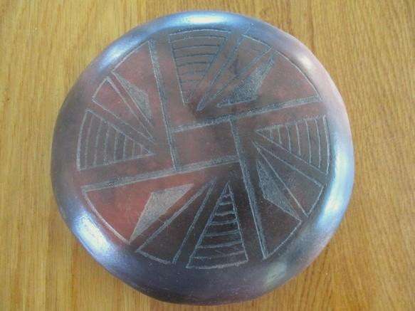So unique!  African etched baked clay trivet/pot stand