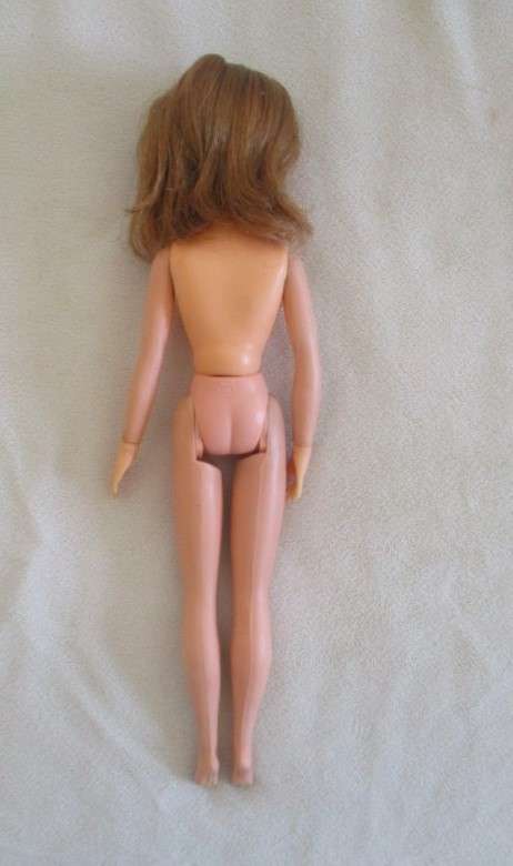 A vintage red headed Sindy doll