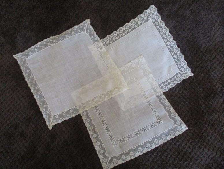 Three vintage hankies with delicate lace borders