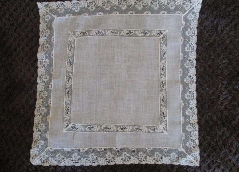 Three vintage hankies with delicate lace borders