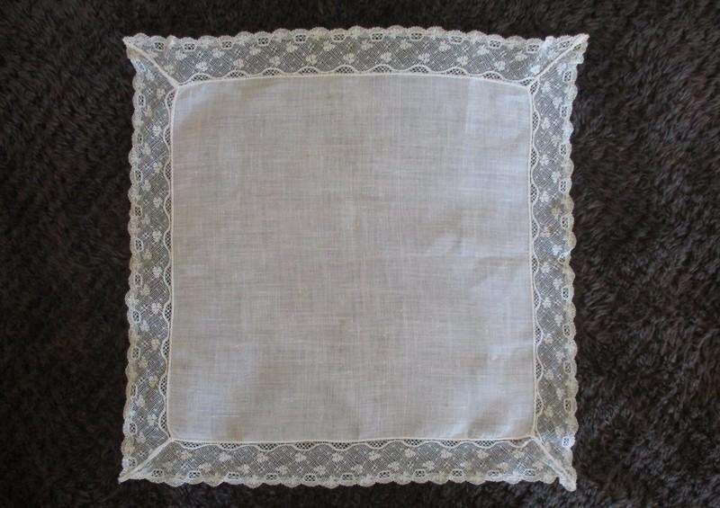 Three vintage hankies with delicate lace borders