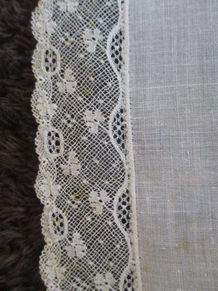 Three vintage hankies with delicate lace borders