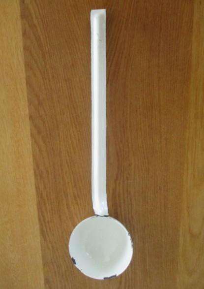Three long vintage white enamel ladles