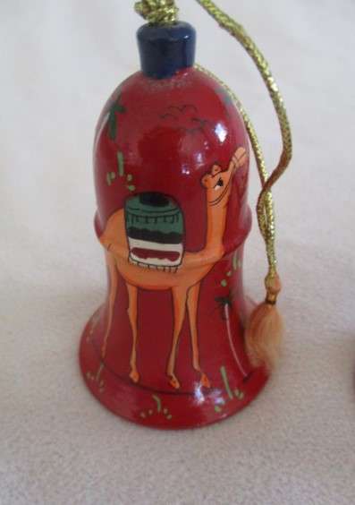 Two rather unique vintage Middle Eastern hand painted wooden Christmas bells