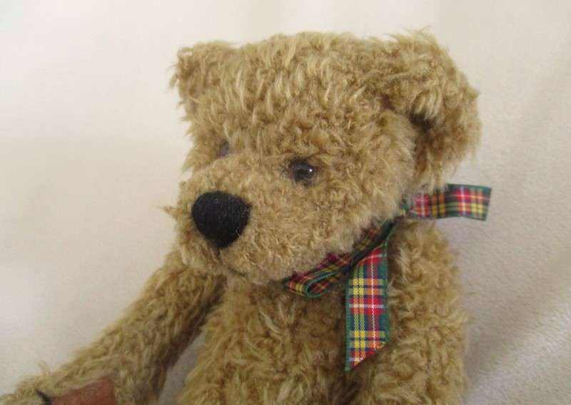 Collectable "Heartfelt Collectibles" Teddy Bear with purposeful "antique bear" look