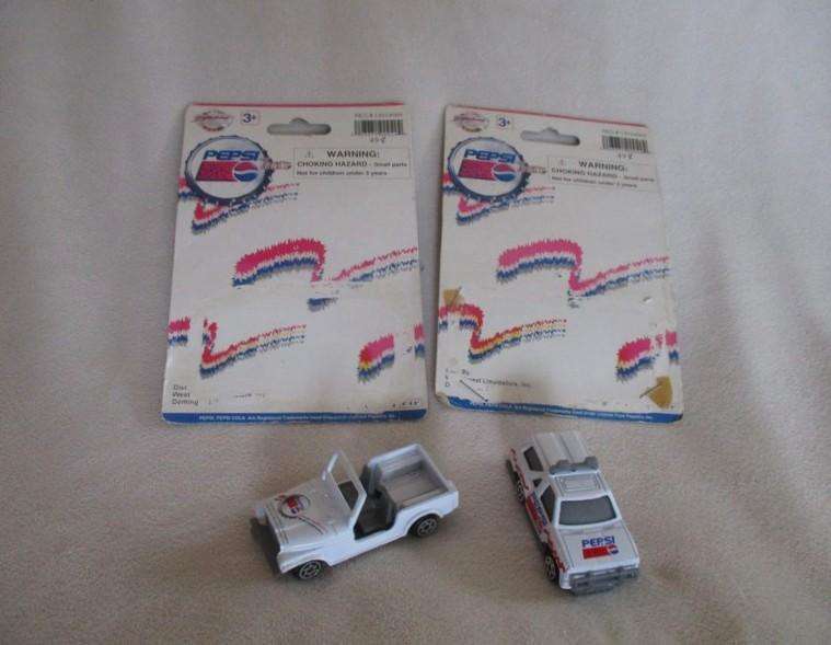 2. - Batch of four rather rare and very collectable Pepsi die cast vehicles