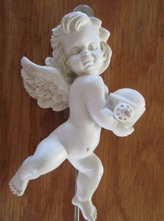 Two cute Cherub clothes hooks