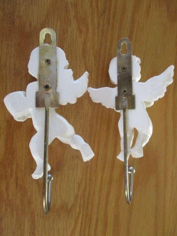 Two cute Cherub clothes hooks