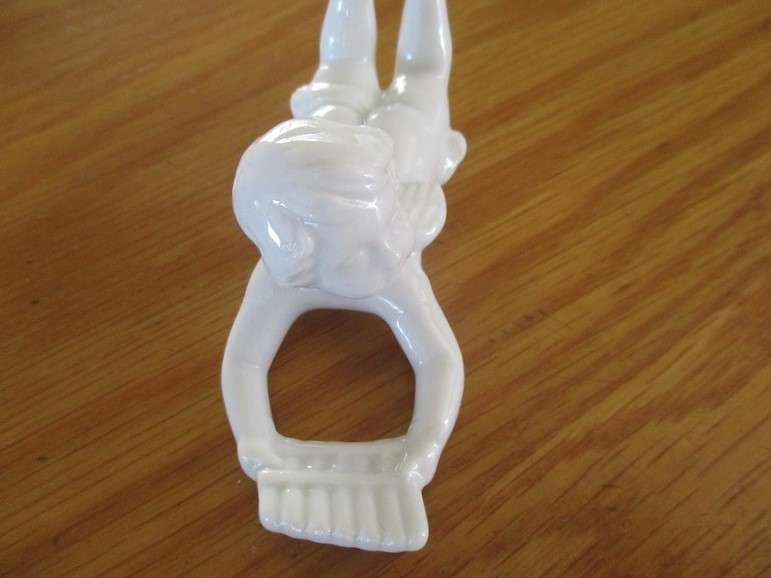 Eight beautiful blanc de chine cherub wall hangers/napkin holders/ornaments