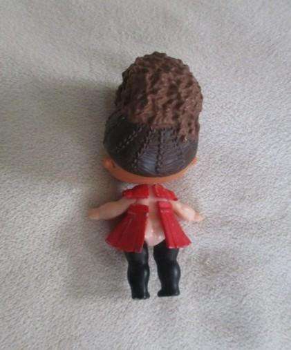 Two adorable small LOL Surprise dollies made by MGA plus one curly-haired friend