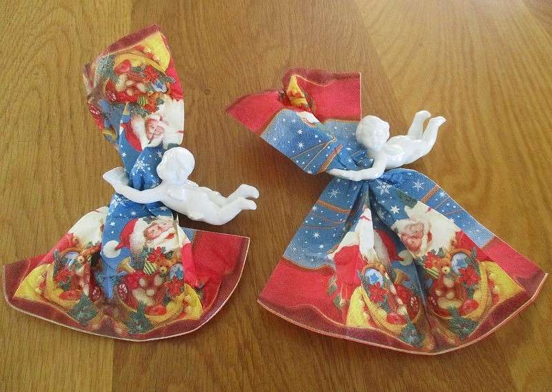 Eight beautiful blanc de chine cherub wall hangers/napkin holders/ornaments
