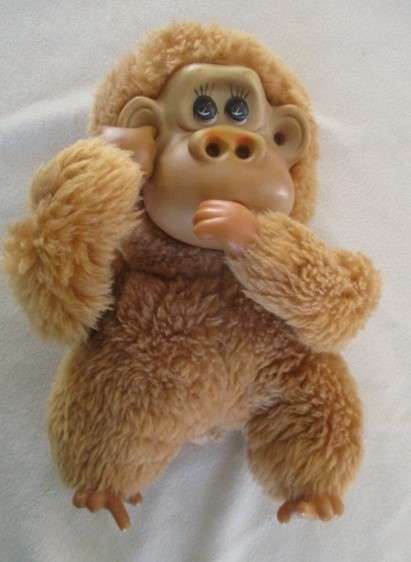 Adorable and mischievous Rutherford III - the Russ Berrie baby gorilla