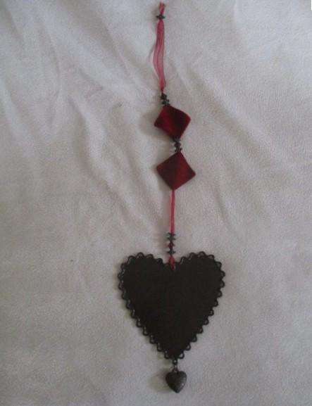 A cute small vintage metal wall/mirror/window hanging heart shaped sign with angels