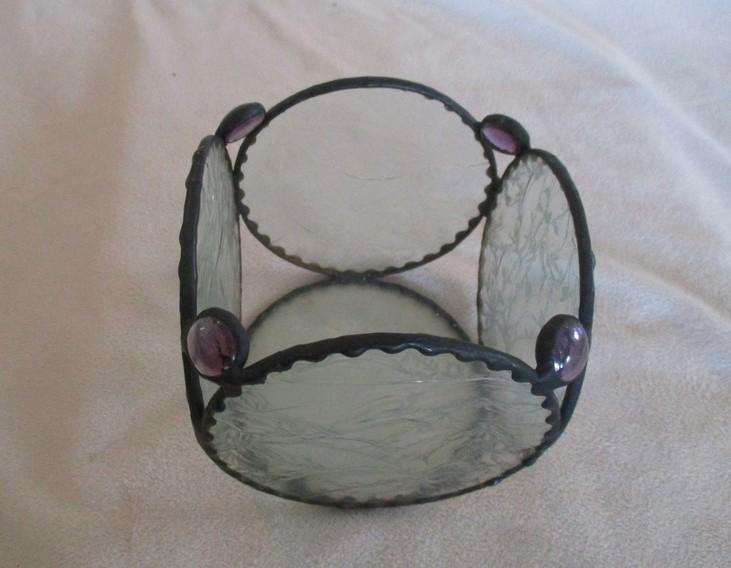 Decorative, nice-sized metal and textured glass candle holder