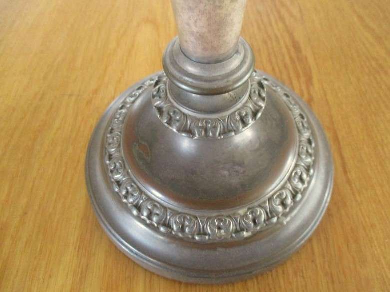 An old vintage, heavy(1.5kgs) candlestick with loads of character