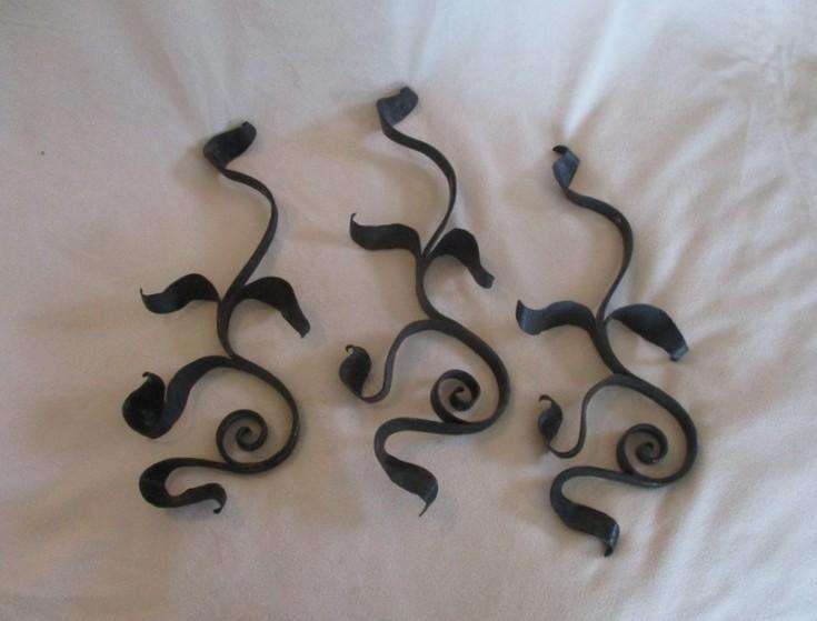 Three vintage black metal wall mount open scroll shaped hanging brackets
