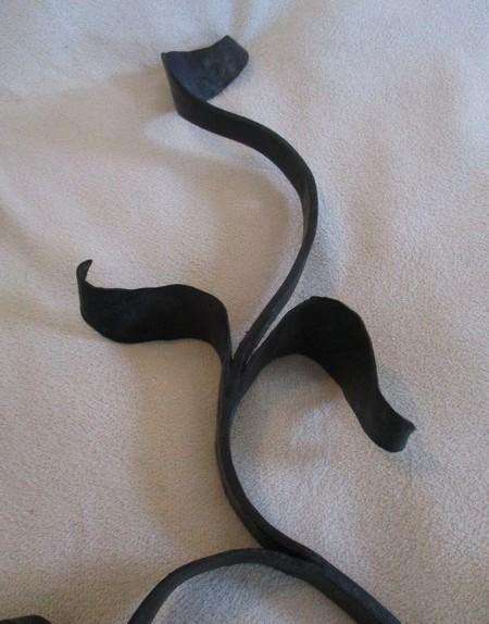 Three vintage black metal wall mount open scroll shaped hanging brackets