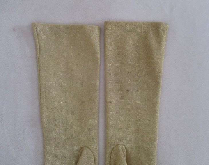 A pair of elegant gold long evening gloves -Dorelle antelope gloves